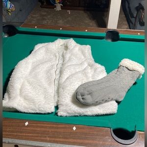 Brand new. Never worn. Faux fur vest (L) & winter cozy sox.  Will bundle anythin
